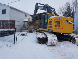 ISA Co. Excavation: Demolition Services Toronto in Snow